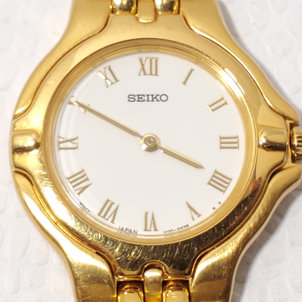 Vintage SEIKO 1F20-1C80 Ladies Dress Watch Gold Tone SAPPHIRE Crystal Leather